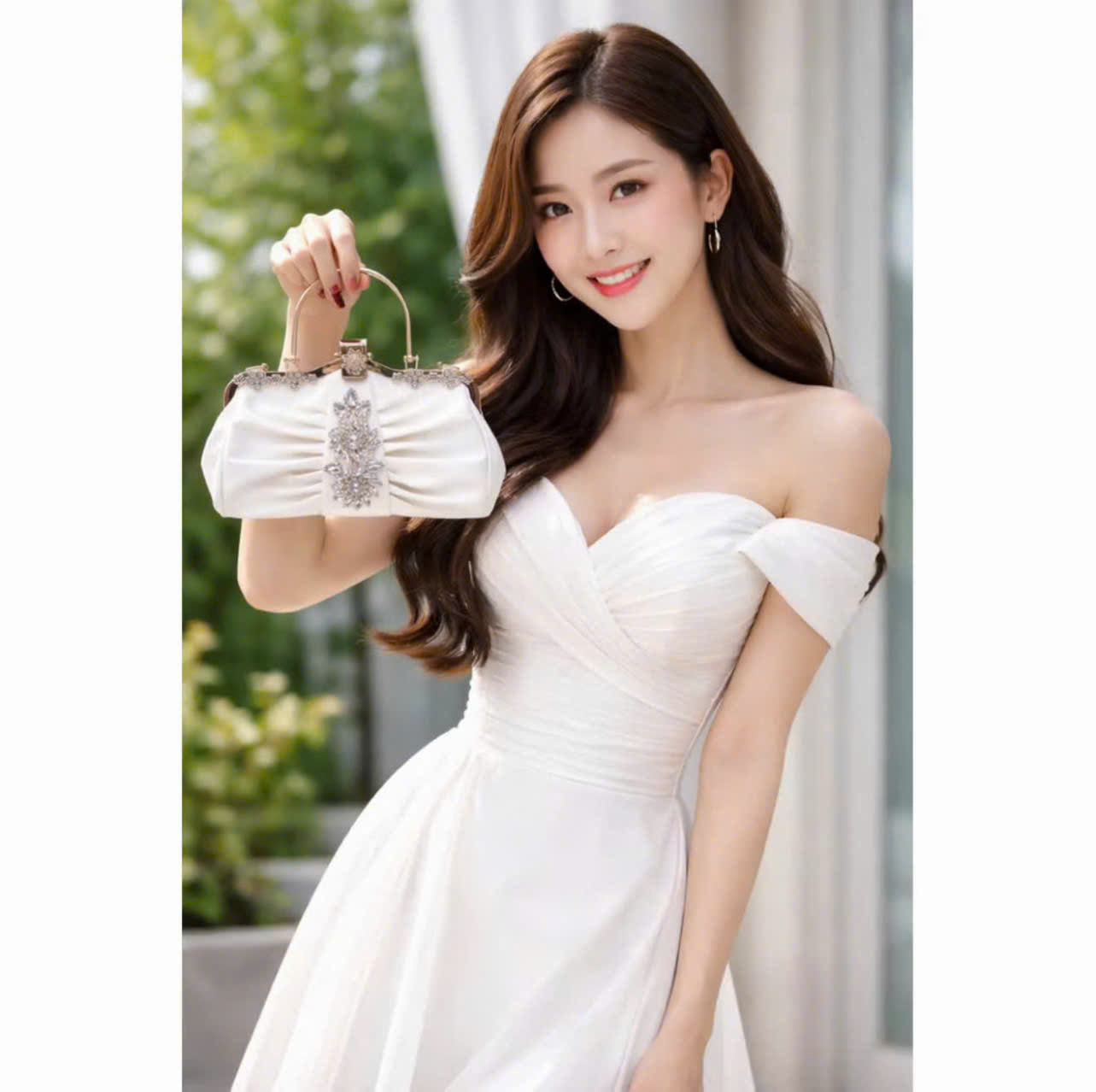 Metallic handbag with stone embellishments