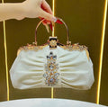 Metallic handbag with stone embellishments